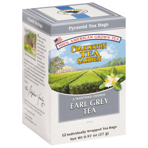 Box of Charleston Tea Garden Earl Grey Pyramid tea featuring 12 individually wrapped bags, highlighting 100% American grown tea with a scenic tea garden illustration.