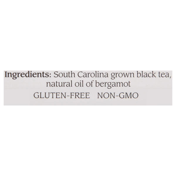 Close-up of the ingredient list showing South Carolina grown black tea and natural oil of bergamot, highlighting gluten-free and non-GMO qualities.