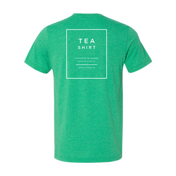 Heather Kelly green casual t-shirt with a simple white square logo on the back promoting tea and Charleston Tea Garden in a clean, modern design.