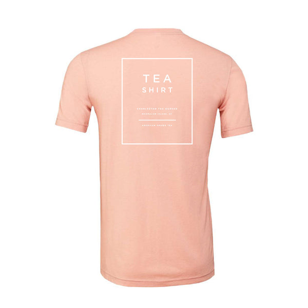 Heather peach short-sleeve t-shirt with simple white text design on the back, offering a soft and comfortable casual apparel option for tea enthusiasts.