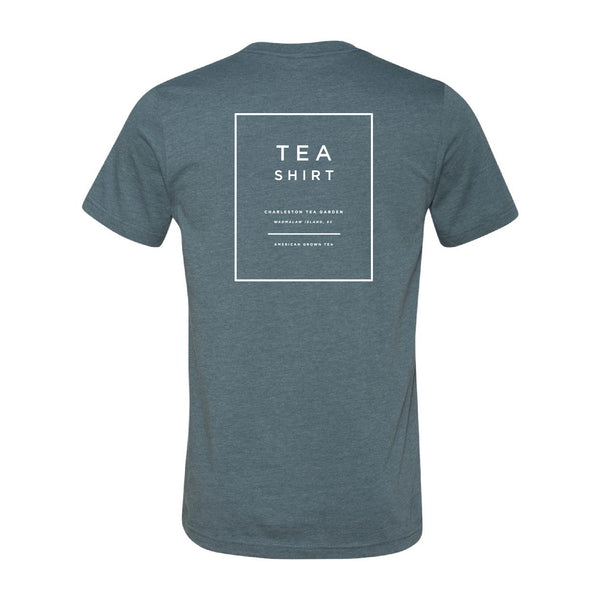 Heather slate-colored casual T-shirt with simple white text design referencing Charleston Tea Garden, shown from the back.