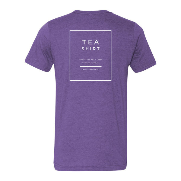 Heather purple casual t-shirt featuring a simple white square design with text referencing Charleston Tea Garden, perfect for tea lovers and apparel enthusiasts.