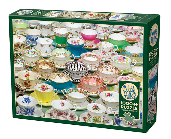 A colorful assortment of vintage tea cups with intricate floral and gold designs displayed closely together, featured on a 1000-piece puzzle box with a friendly and charming vibe.