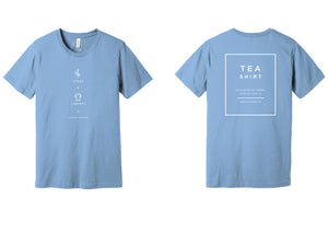 Heather Carolina blue T-shirt with minimalist tea-themed graphics on front and text design on back, showcasing casual apparel inspired by Charleston Tea Garden.