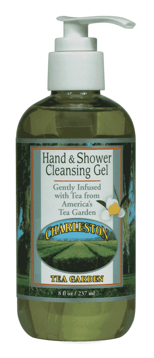 Clear pump bottle of cleansing gel infused with tea from Charleston Tea Garden, featuring a nature-inspired label with green tea fields and white flower illustration.