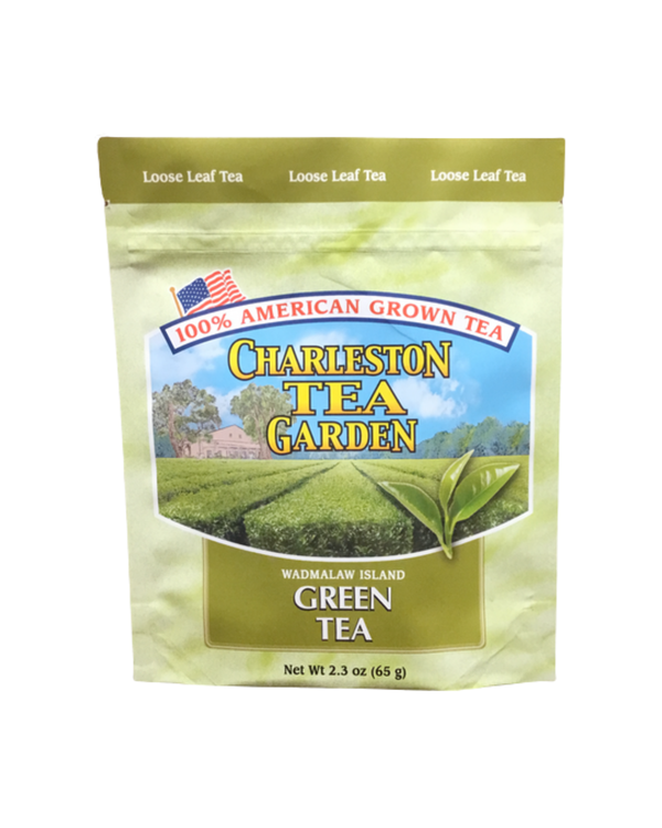 Package of Charleston Tea Garden loose leaf green tea from Wadmalaw Island, showcasing American-grown tea with vibrant green fields and fresh tea leaves on the label.