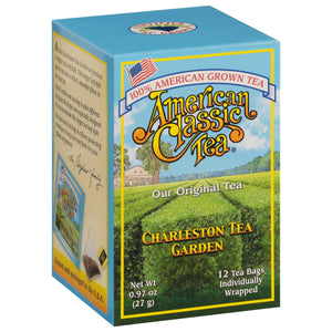 Box of American Classic Tea featuring a scenic tea garden with green fields and blue sky, highlighting 100% American grown tea from Charleston Tea Garden.