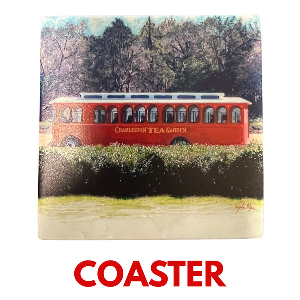 Square marble coaster featuring a colorful illustration of a red trolley with "Charleston Tea Garden" text, set against trees and greenery in the background.