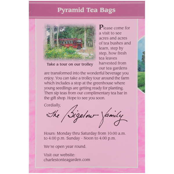 Back of a tea package with a warm invitation to visit Charleston Tea Garden, featuring a trolley tour image and details about tea harvesting and complimentary tea tasting.