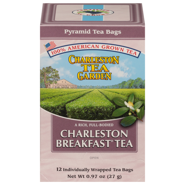 Box of Charleston Breakfast Pyramid tea bags featuring an American-grown tea with a scenic tea garden field and a tea flower illustration on the front.