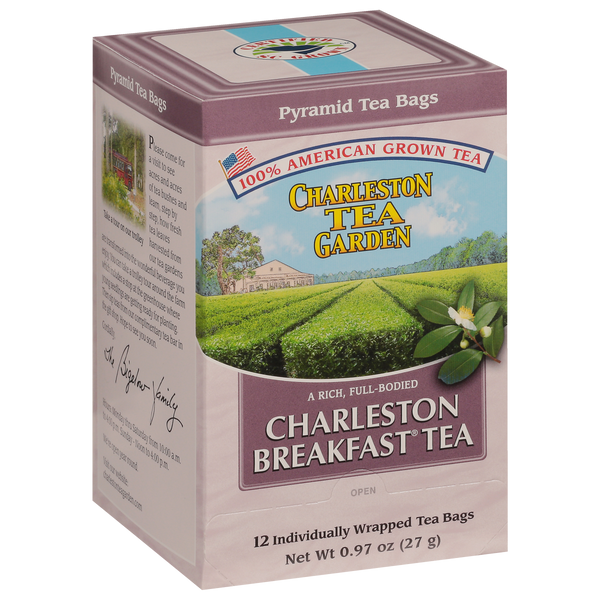 Box of Charleston Breakfast Pyramid tea bags featuring vibrant tea field illustration and branding highlighting 100% American grown tea from Charleston Tea Garden.