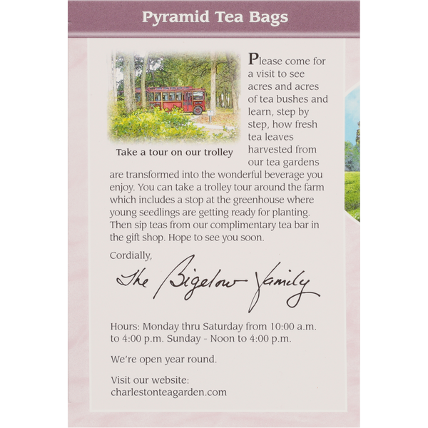 Informational card inviting visitors to tour acres of tea bushes and enjoy a trolley ride at Charleston Tea Garden with a complimentary tea bar in the gift shop.