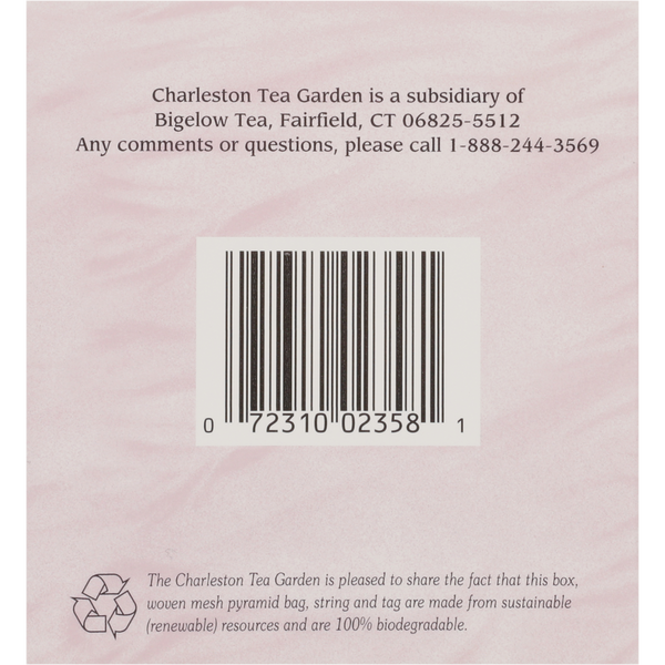 Barcode on a pink background with Charleston Tea Garden customer service information and a note about the biodegradable, sustainable materials used in the pyramid bag packaging.
