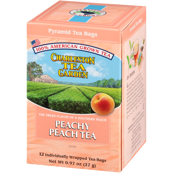Peach-flavored pyramid tea bags box featuring the Charleston Tea Garden logo, highlighting fresh Southern peach flavor with imagery of a peach and tea fields.