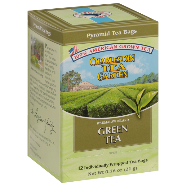 Box of Charleston Tea Garden green tea featuring a scenic view of tea fields on Wadmalaw Island with 12 individually wrapped pyramid tea bags inside.