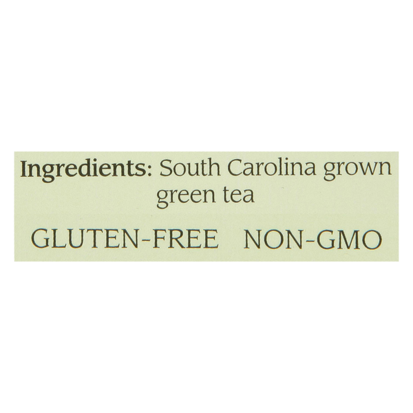 Close-up of a label showing ingredients listing South Carolina grown green tea, highlighting that the product is gluten-free and non-GMO.