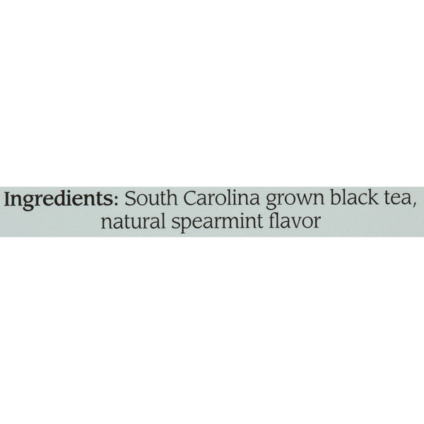 Close-up of a label showing ingredients listing South Carolina grown black tea and natural spearmint flavor, reflecting a simple, natural tea blend.