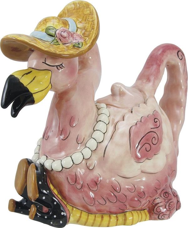 Ceramic flamingo-shaped teapot wearing a yellow sunhat adorned with flowers, pearl necklace, and black polka-dot high heels, showcasing whimsical vintage charm.