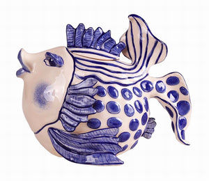 Ceramic teapot shaped like a fish, decorated with blue and white patterns inspired by traditional Delft pottery.
