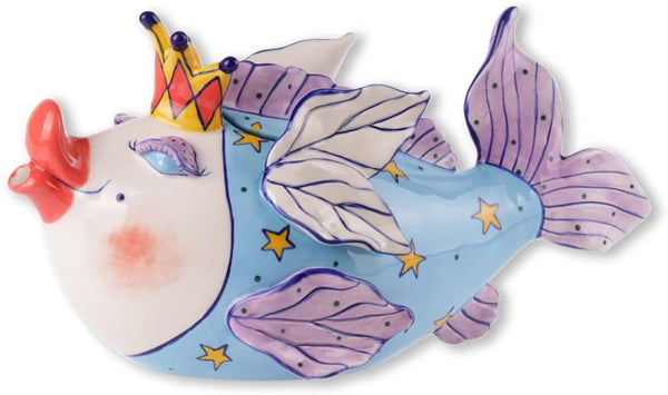 Whimsical ceramic fish-shaped teapot with a colorful crown and star-patterned blue and purple body, adding a playful touch to any tea setting.