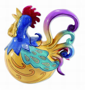 Colorful ceramic teapot shaped like a whimsical rooster with a bright red comb, blue head, and a swirling, multicolored tail in vibrant shades.