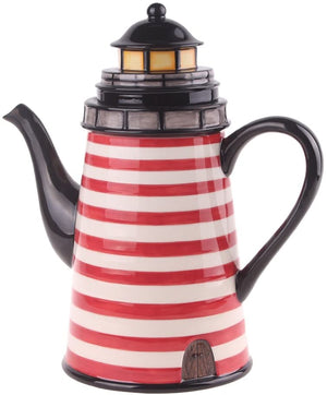 Ceramic teapot designed to resemble a lighthouse with red and white stripes and black handle and spout, ideal for enjoying tea with a charming coastal flair.