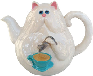 Whimsical white cat-shaped ceramic teapot holding a small gray mouse and blue teacup, perfect as a charming souvenir or tea accessory.