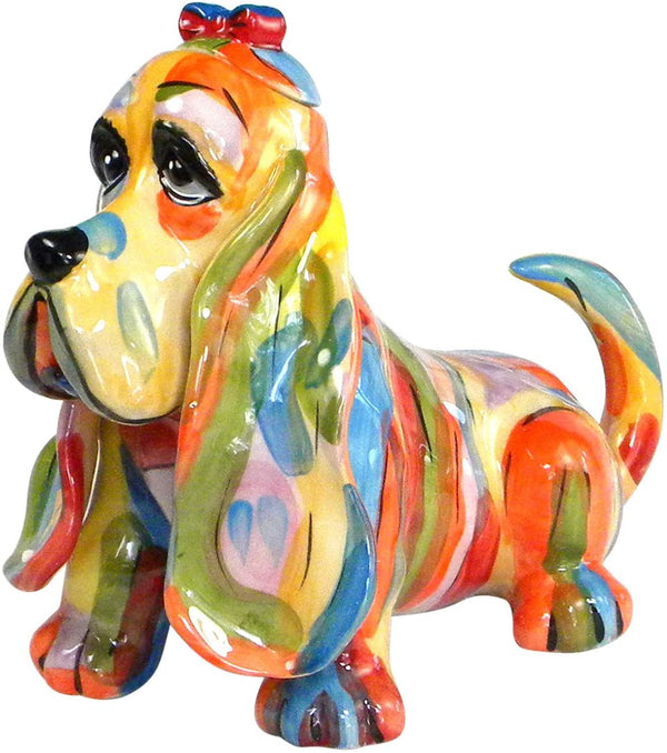 Colorful ceramic teapot shaped like a playful cocker spaniel dog with long ears and a vibrant, multicolored finish, perfect for tea lovers and collectors.