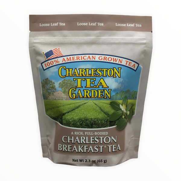 Package of Charleston Breakfast loose leaf tea featuring an illustration of lush green tea fields and a small American flag.