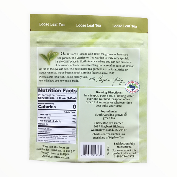 Back of a green pouch showing information about American-grown loose leaf green tea, including brewing directions, nutrition facts, ingredients, and a note inviting visitors to the Charleston Tea Garden.